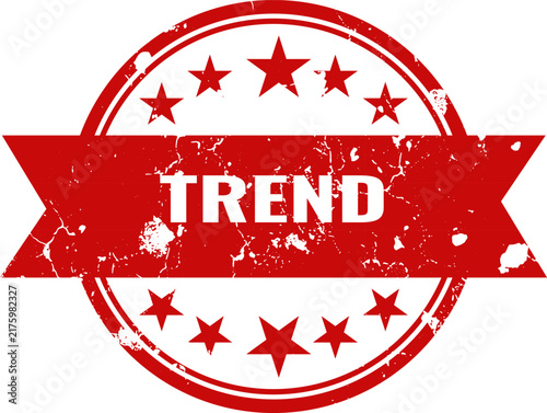 A vibrant red distressed grunge style stamp illustration features the word trend prominently displayed on a flowing ribbon surrounded by decorative star accents