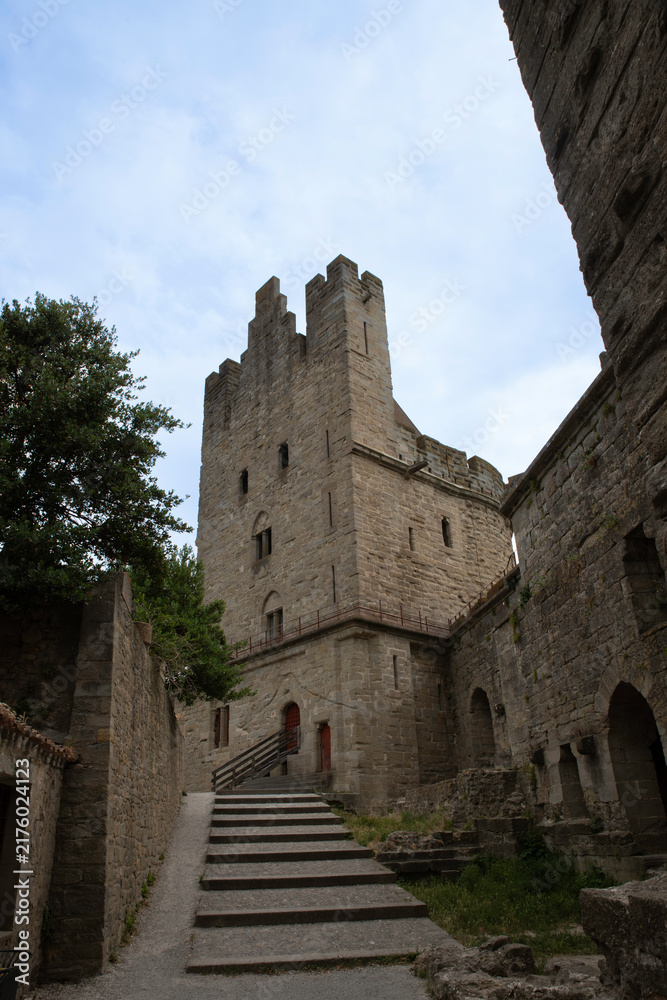 Obraz premium Medieval Stone Castle Tower and historic Fortress Architecture