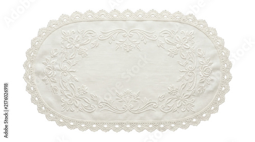 Foto Oval white paper doily with delicate lace pattern for elegant table decoration a
