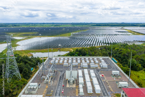 Aerial view of solar‑storage integrated power station with container energy storage