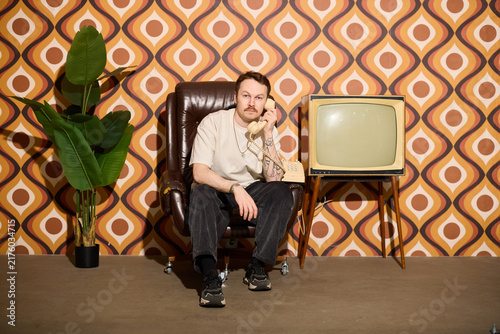 Obraz na płótnie Vintage setting features poised man with stylish surroundings