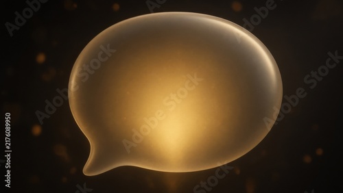 Glowing Speech Bubble Icon with Warm Light on Dark Background