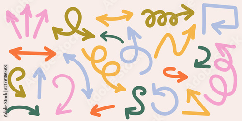 Collection of bright colorful hand drawn arrows, loop pointers, and curly direction signs on a beige background. Doodle style navigation icons for creative web headers, planners, and school charts.