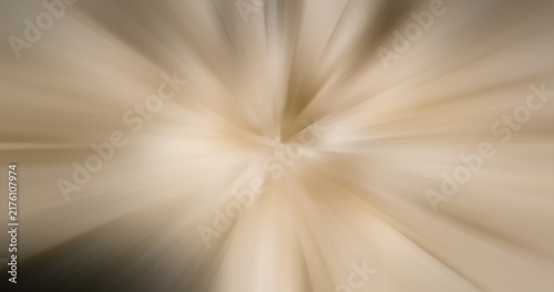 Abstract central radial blur background in beige brown colors. Dynamic light ray burst motion texture for technology, presentation, banner, and backdrop design