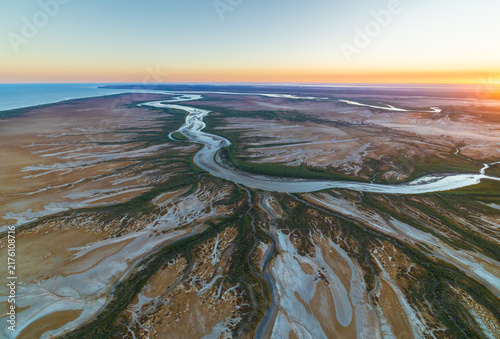 Amazing early morning aerial view on tidal mud flats taken from a helicopter around the Derby area, Kimberley region, Western Australia