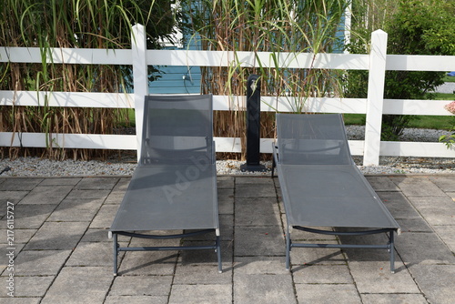 Cuadro en lienzo Outdoor sun loungers in a relaxing leisure area