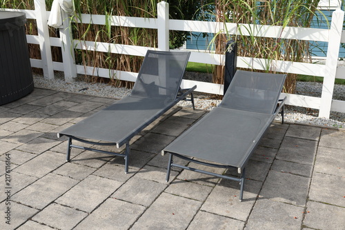 Konstfotografi Outdoor sun loungers in a relaxing leisure area