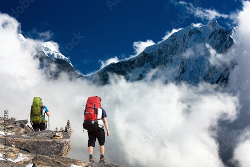 hiker trekker mountaineer tourist taveler backpacker