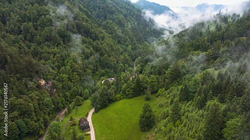 Obraz na plátně Spectacular drone overview reveals high mountain ridges along border of Austria and Slovenia