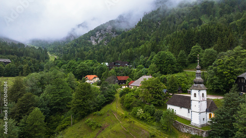 Fotografie Spectacular drone overview reveals high mountain ridges along border of Austria and Slovenia