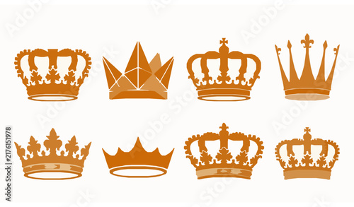 Fotografie Collection of ornate golden crowns in various royal designs and styles isolated