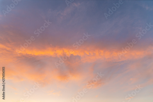 abstract background of cloudy sunset sky golden hour