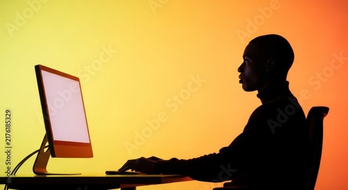 A seated, dark-toned profile remains still within a stark, minimalist office space, capturing a moment of serene focus and quiet composure, break, clean, calm