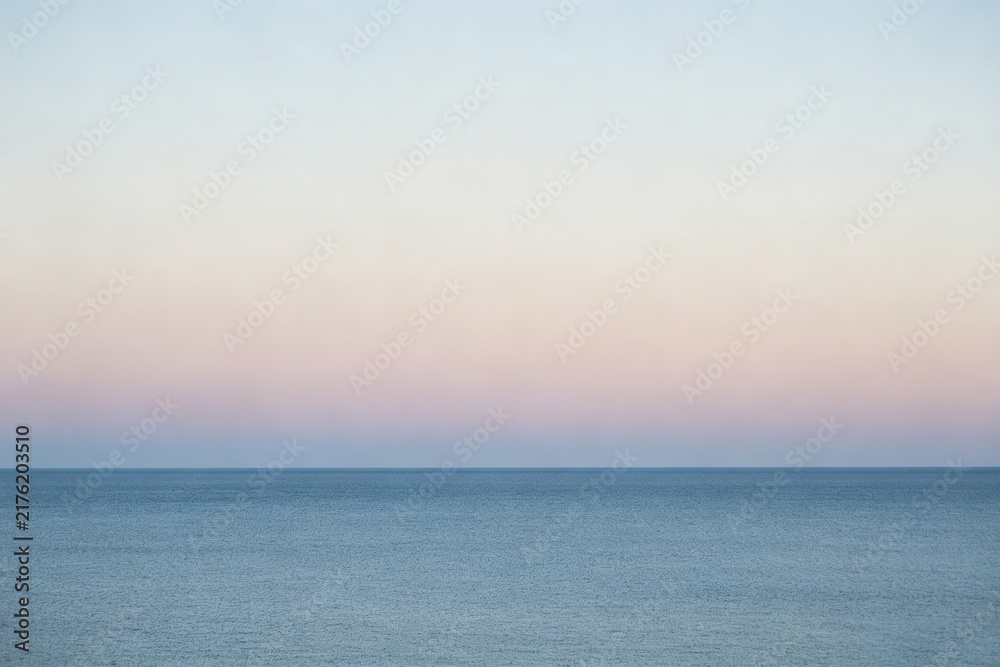Obraz premium Minimalist Coastline Horizon, Pastel Sky and Calm Sea Blue Split