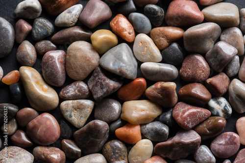 Photography Smooth colorful pebbles creating natural rock background texture