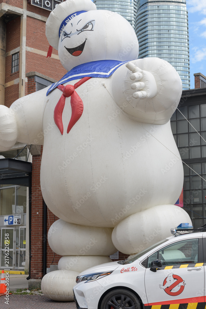 Obraz premium Ectomobile and Stay Puft Marshmallow Man part of non-profit charitable fan and cosplay organization, Ghostbusters Toronto on Bremner Blvd (August 28, 2026)