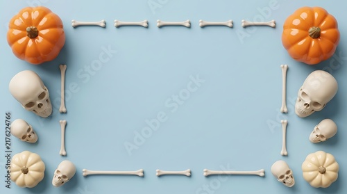 Halloween background frame with skulls pumpkins bones on blue surface skeleton celebration seasonal decoration template copyspace traditional horizontal composition