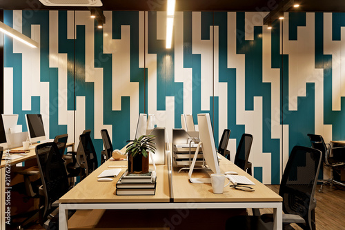 Modern Luxury Office Interior Design with Open Workspace and Geometric Accent WalL