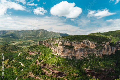 Quadro su tela Siurana sandstone cliffs and winding mountain road in Prades Mountains, Cataloni