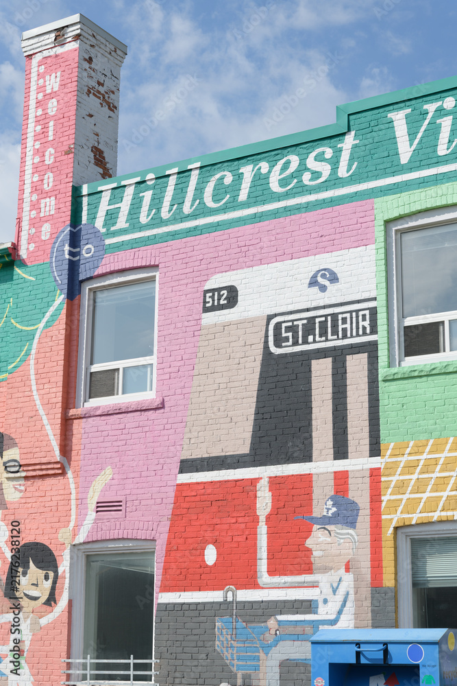Obraz premium mural on exterior east wall of 791 St Clair Av W, Toronto - Hillcrest Village sign