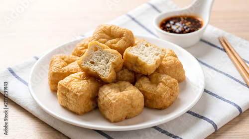 Golden fried tofu cubes, Crispy deep fried bean curd, Asian snack with dipping sauce