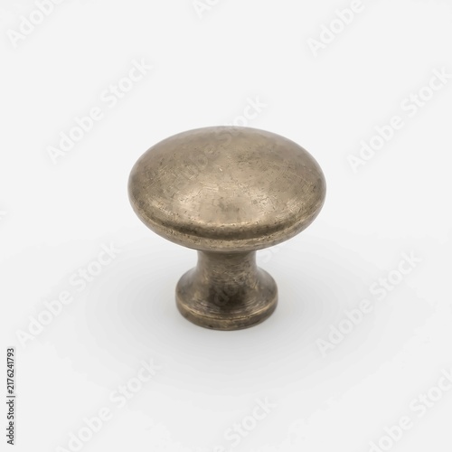 Antique brushed brass cabinet knob with a rounded smooth top surface isolated on a clean plain white studio background setup