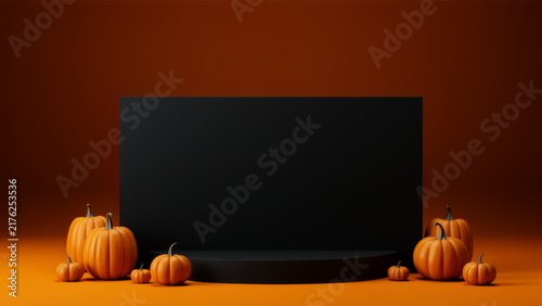Blank black chalkboard framed by small orange pumpkins in a warm autumn setting offering seasonal copy space for Halloween messages harvest promotions classroom notes and events