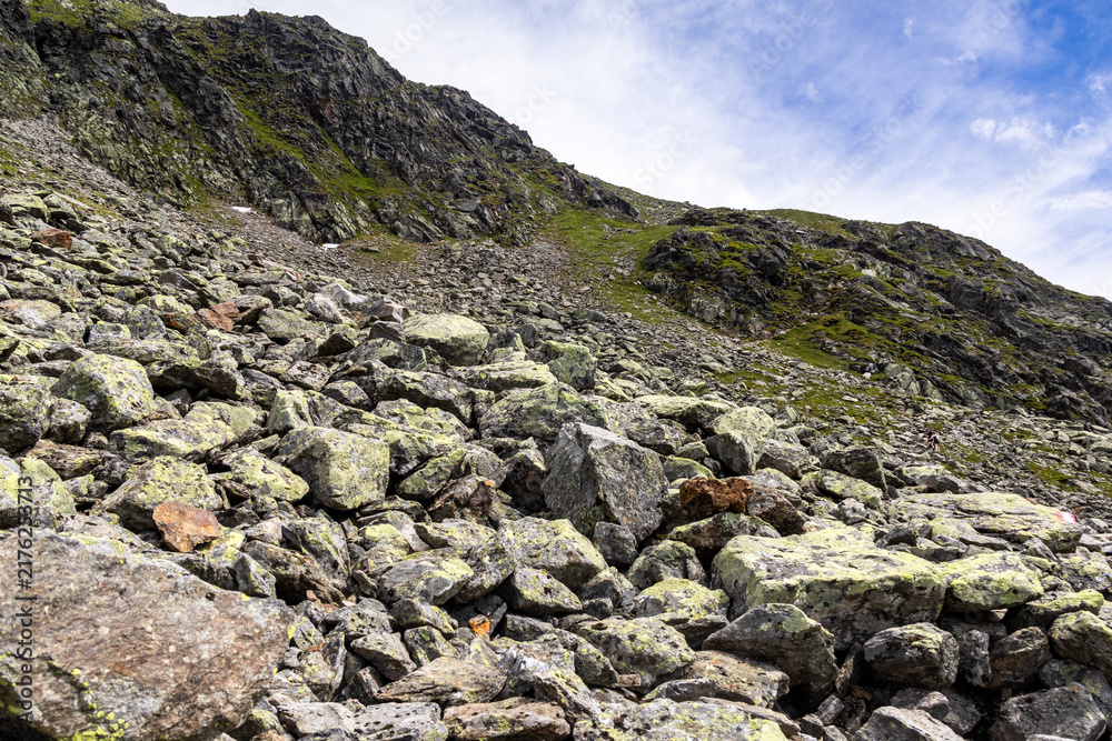 Obraz premium Mountain scree slope and rocky alpine terrain, Austria, Tyrol, Pitztal, Mittelberg, 29 June 2026