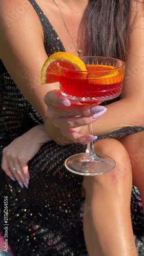 Woman In Dress Holding Aperol Spritz Cocktail Video