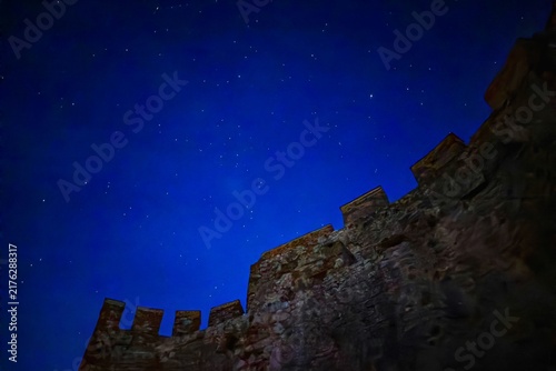 Starry Night Sky Background with Faint Meteor Trails and Deep Space Stars