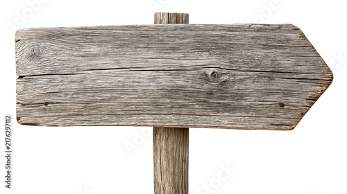 Cuadro en lienzo Weathered rustic wooden arrow signpost with textured grain