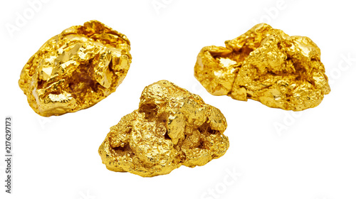 Photography Three shiny raw gold nuggets with textured metallic surfaces