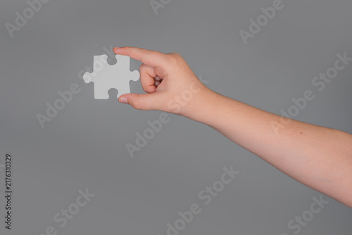 Fotografie Solving problem starts with single puzzle