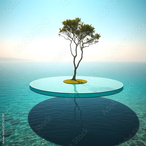 A slender tree rises from a tiny circular green island floating over calm turquoise water, with a pale blue sky and soft horizon emphasizing the simplicity and isolation of the scene.