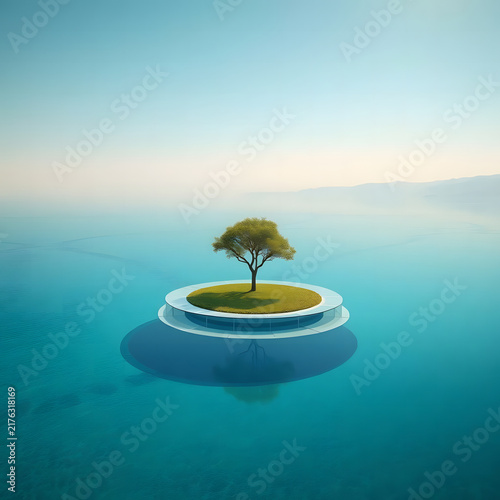 A small green tree stands alone on a round floating island above a vast turquoise ocean, surrounded by soft mist and a pale blue sky in a peaceful surreal environment.