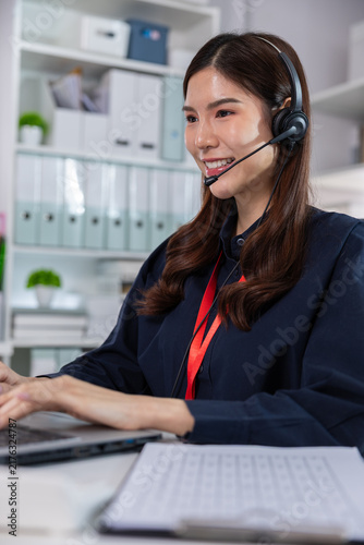 Customer service woman headset office Vertical