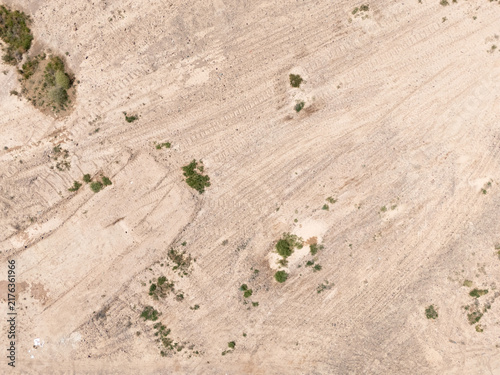 Принти на полотні aerial drone view of desert land texture and terrain