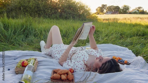 A Relaxing and Enjoyable Picnic Scene Featuring Book Reading in Nature