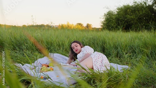 Experience a Serene Picnic in Nature Enjoying Relaxing Moments Among Tall Grass