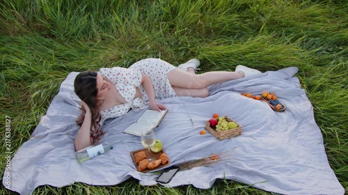 Enjoying a relaxing time in nature with good books and fresh fruits