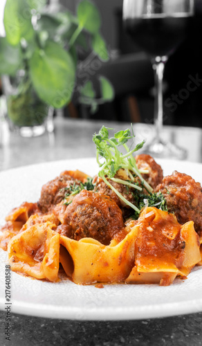 Obraz na płótnie Prupetti sicilan Polpette In Sugo meatballs in ragu tomato sauce with Pappardell