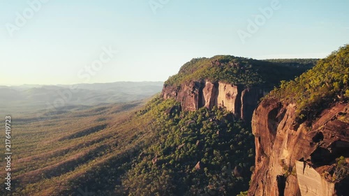 Golden hour drone view of Mount Mulligan cliffs in Australia