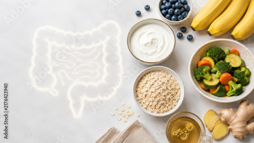 Healthy Foods for Gut Health with Intestine Shape on Light Background