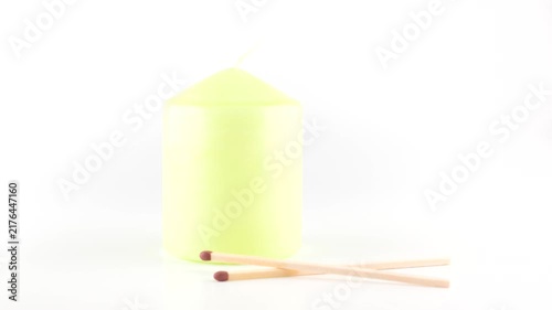 light green color wax candle isolated