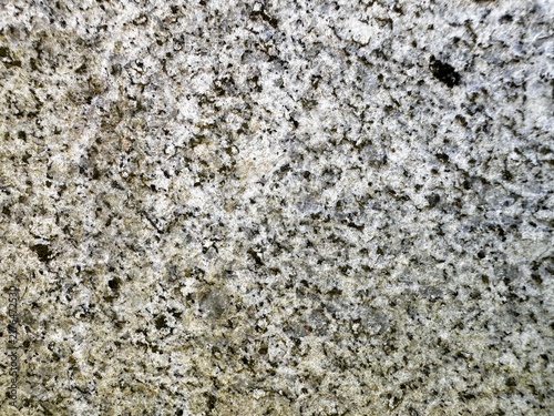 Photography Detailed full frame shot of a speckled grey and white mineral granite rock surfa