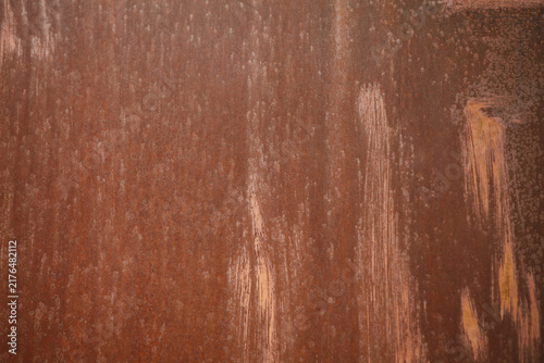 Fotografía Brown rusty metal texture with rough grunge scratches and aged iron corrosion