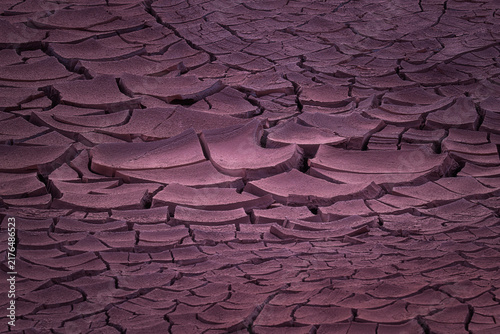 фотографія Abstract background of cracked earth and dry soil