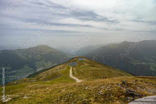 Alpine Mountain Trail Along Ridge With Small Tarn Lakes and Panoramic Valley View