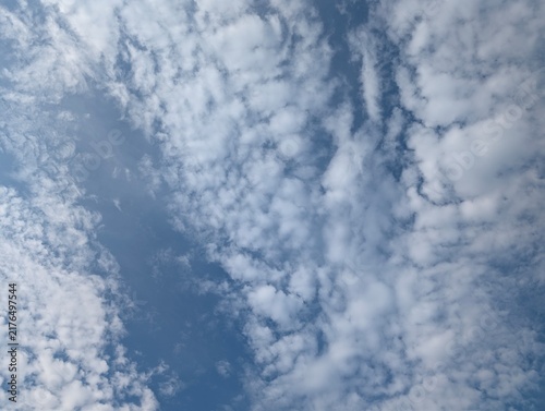 Obraz na płótnie Dramatic cloudscape in a blue summer sky during daytime