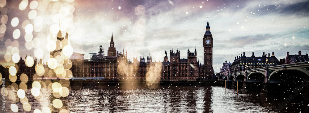 Naklejka premium holiday lights and snowfall in London